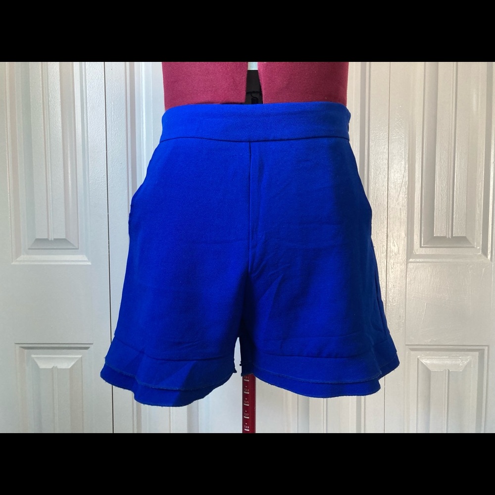 Vintage High waisted, flaired shorts.